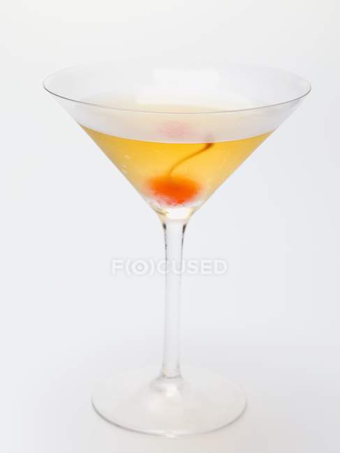 Manhattan with cocktail cherry — Stock Photo