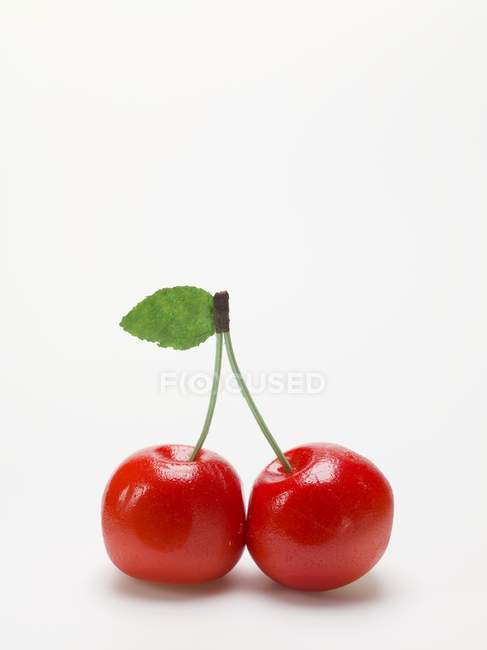 Pair of marzipan cherries — Stock Photo
