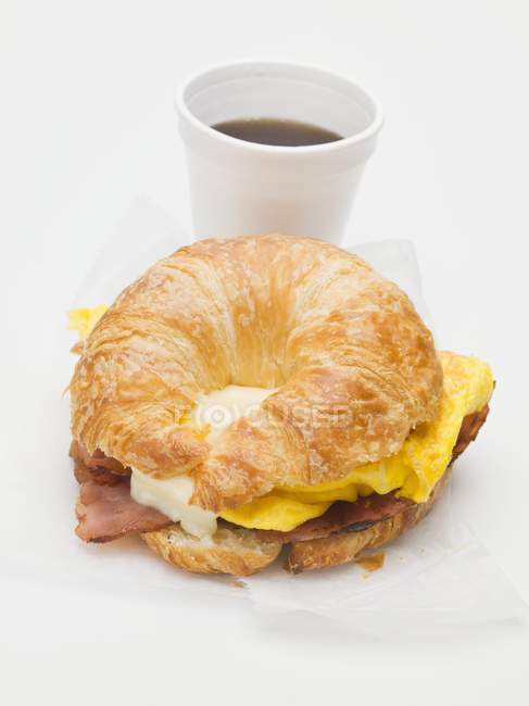 Croissant with bacon and cheese — Stock Photo