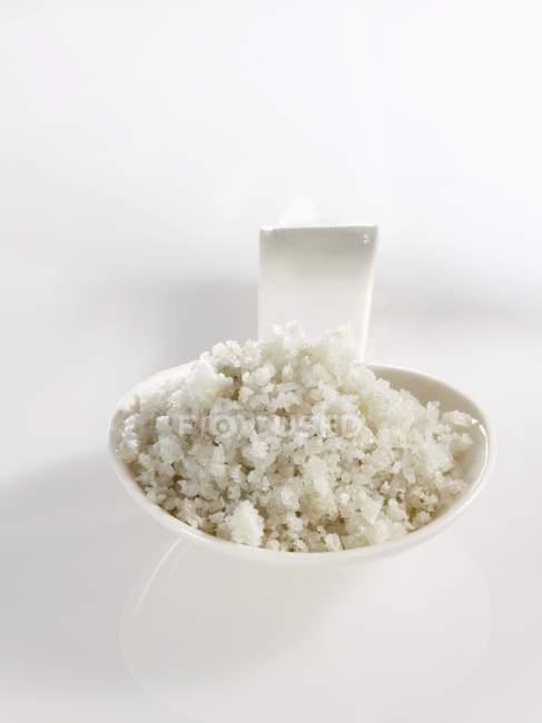 Spoonful of sea salt — Stock Photo
