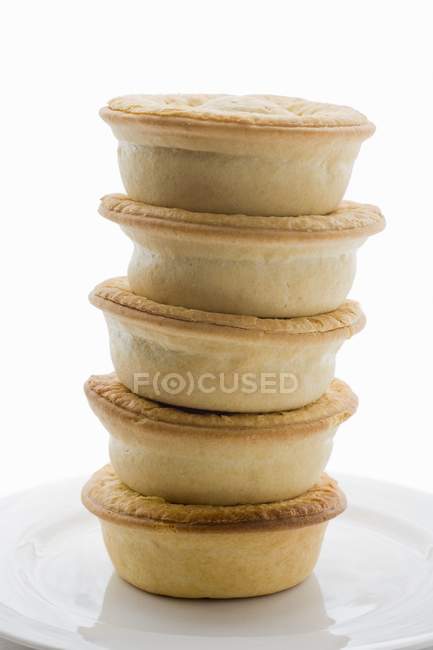 Meat pies stacked — Stock Photo