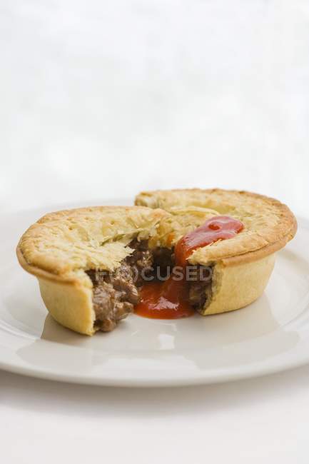 Meat pie with sauce — Stock Photo