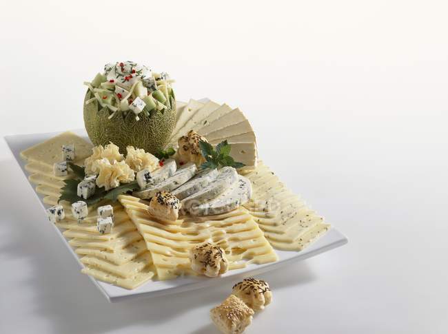 Placa de queijo com melão — Fotografia de Stock