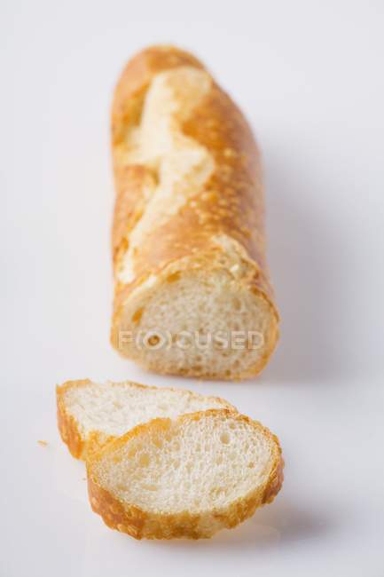 Partly sliced Baguette — Stock Photo