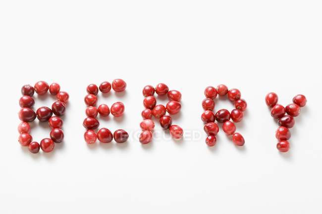 Word BERRY written in cranberries — Stock Photo