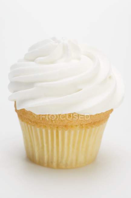 Cupcake with cream topping — Stock Photo