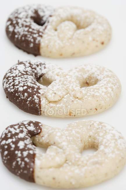 Chocolate-dipped hazelnut pretzels — Stock Photo