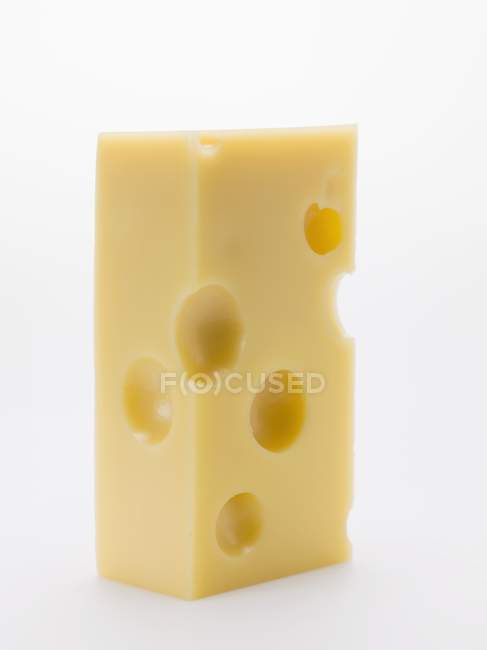 Piece of Emmental cheese — Stock Photo