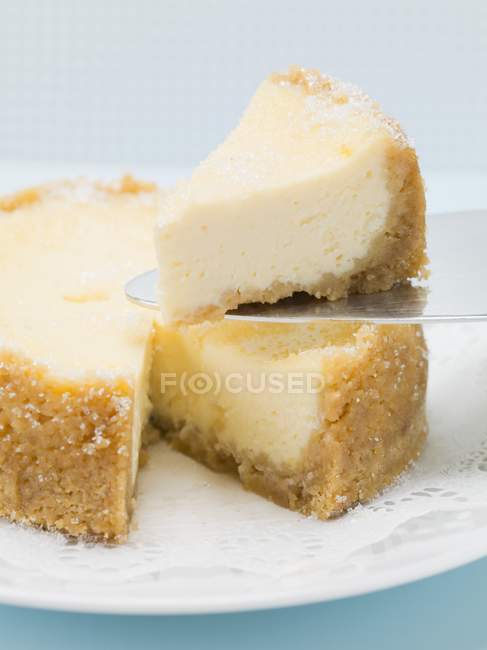 Small cheesecake on server — Stock Photo