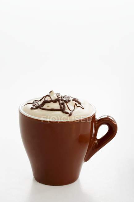 Hot chocolate with cream and topping — Stock Photo