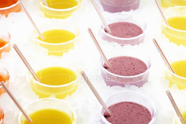 Assorted sweet fruit shakes — Stock Photo