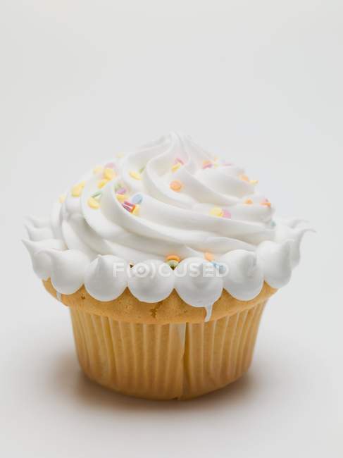 Cupcake con crema y azúcar - foto de stock