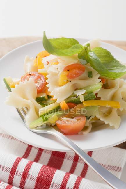 Farfalle primavera pasta with vegetables — Stock Photo
