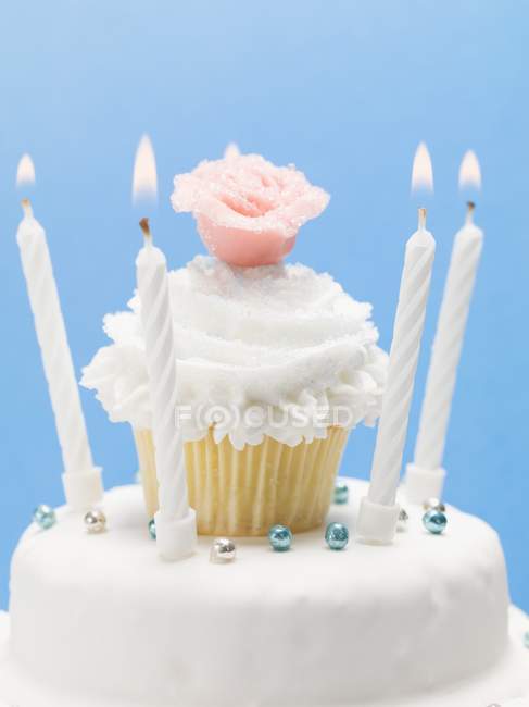 Birthday cake with muffin — Stock Photo