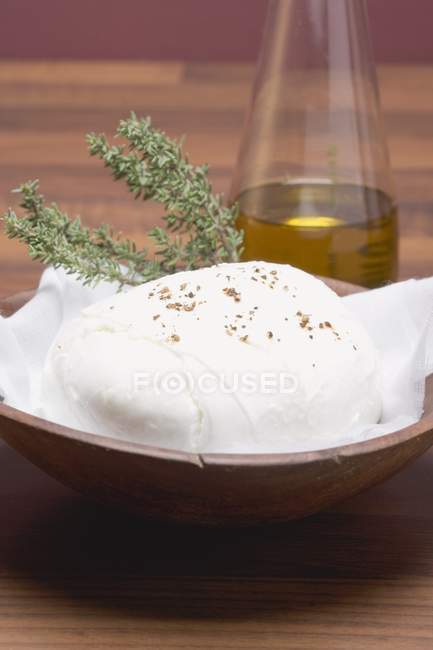 Mozzarella cheese ball with thyme — Stock Photo