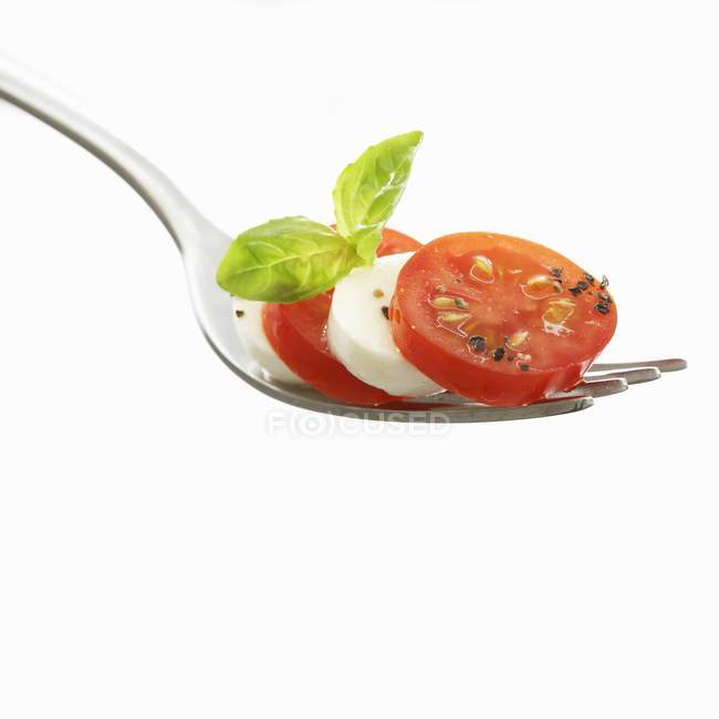 Tomato slices with mozzarella — Stock Photo
