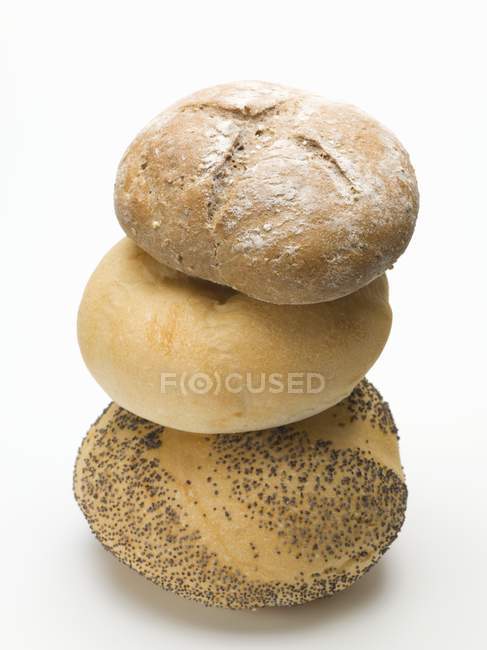 Poppy seed with kaiser and rye rolls — Stock Photo
