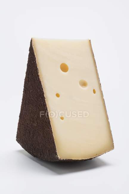 Trozo de queso duro - foto de stock