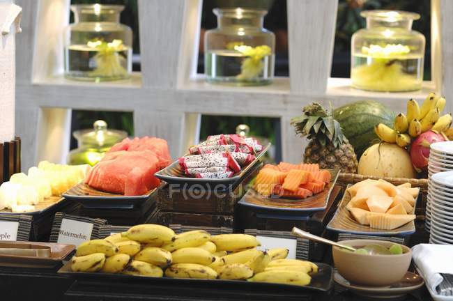 Fresh fruit on a breakfast buffet interior — Stock Photo