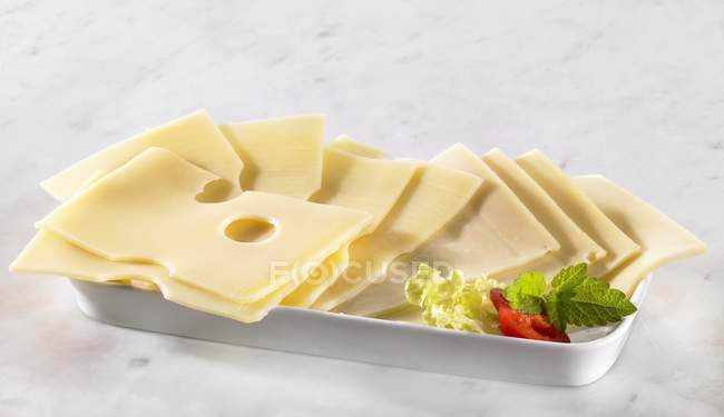 Several slices of cheese — Stock Photo