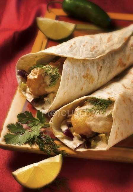 Closeup view of Tortillas with fish and dill filling — Stock Photo