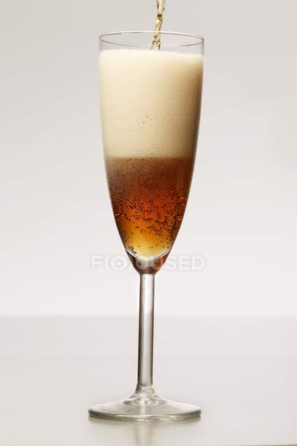 Wheat beer in a sparkling wine glass — Stock Photo