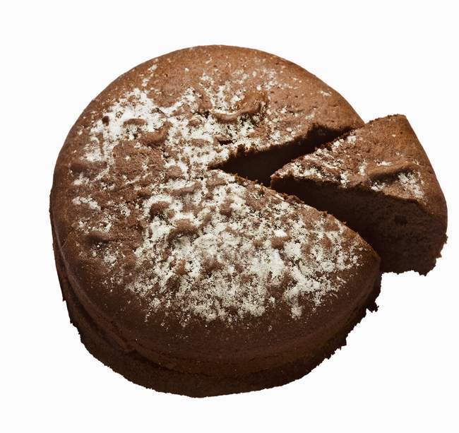 Gâteau au chocolat avec morceau — Photo de stock