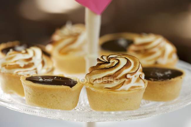 Chocolate tarts with meringue top — Stock Photo