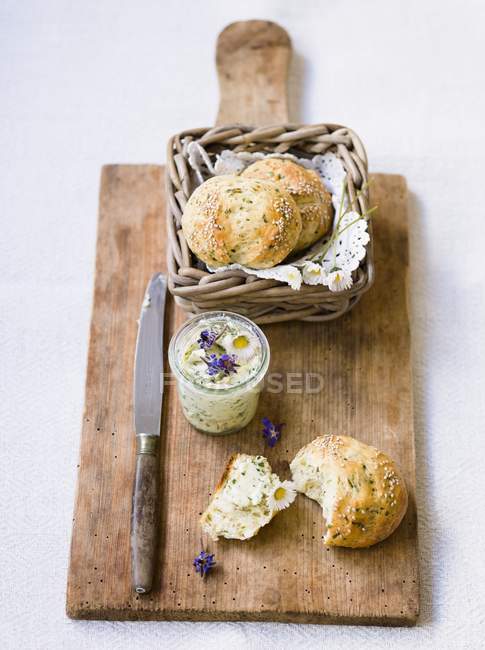Rolls with herb butter — Stock Photo