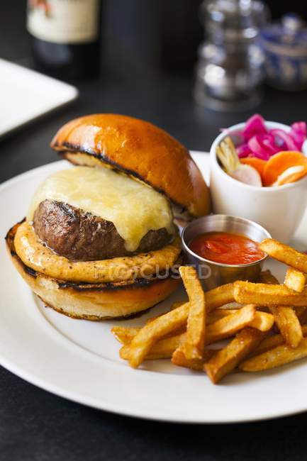 Cheeseburger and French Fries — Stock Photo