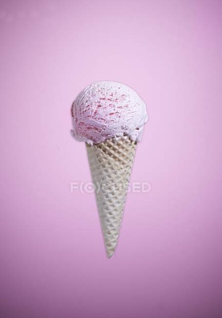 Strawberry ice cream cone — Stock Photo