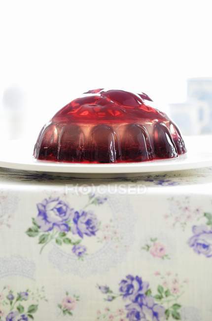 Jelly serving on white plate — Stock Photo