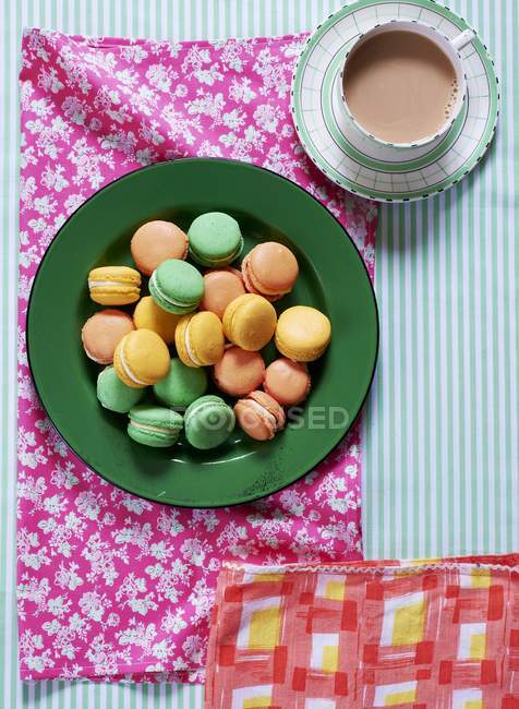 Lots of macaroons on a plate — Stock Photo
