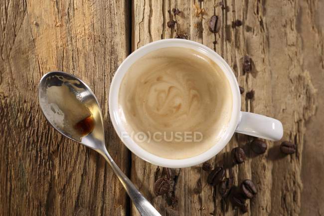 Xícara de café expresso com colher — Fotografia de Stock
