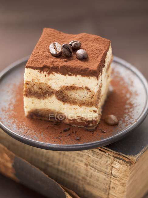 Tiramisu sprinkled with cocoa powder — Stock Photo