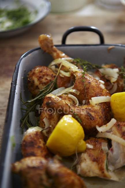Chicken legs with garlic and herbs — Stock Photo