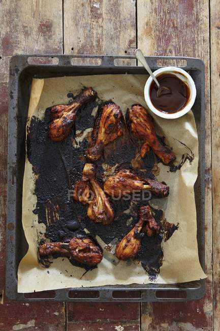 Top view of Memphis drumsticks with barbecue sauce — Stock Photo