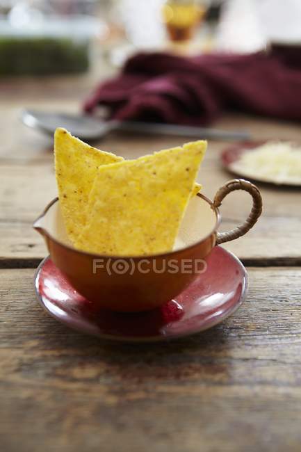Tortilla chips in soup cup — Stock Photo