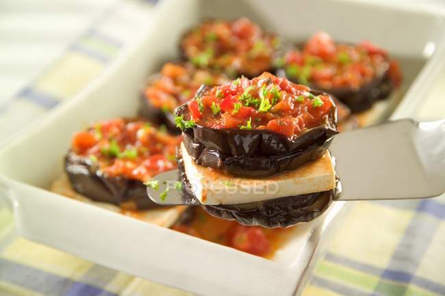 Aubergines with feta and tomatoes — Stock Photo