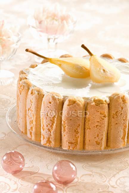 Charlotte with sliced pear on top — Stock Photo