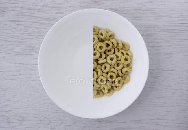 Halved portion of cereal hoops — Stock Photo