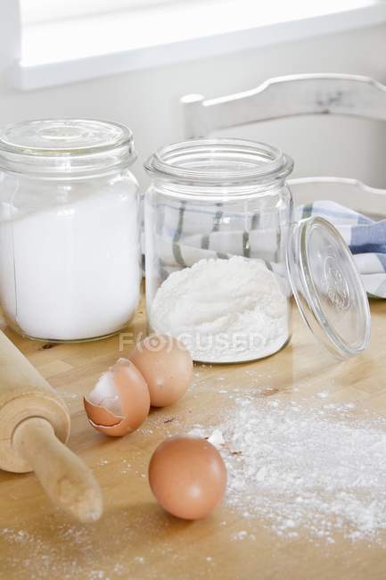 Closeup view of baking ingredients on wooden table — Stock Photo