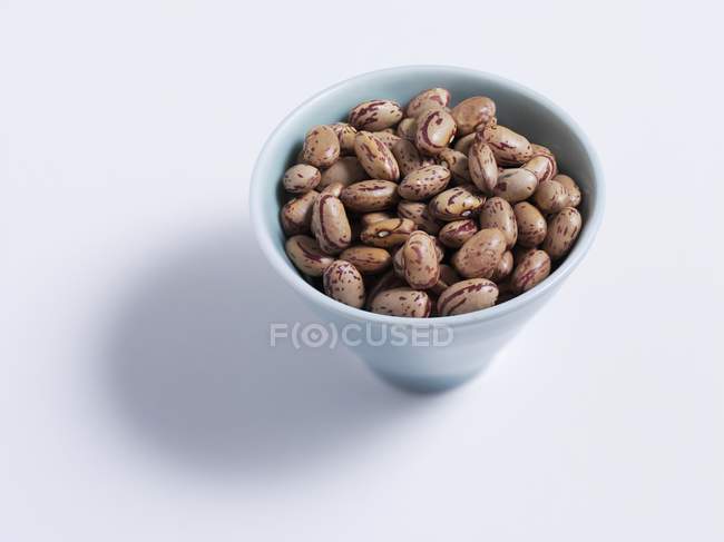 Borlotti beans in bowl — Stock Photo