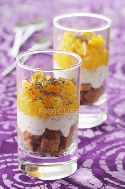 Layered dessert with oranges — Stock Photo