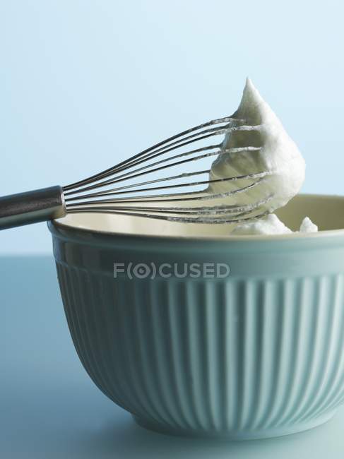 Egg white on an egg whisk — Stock Photo