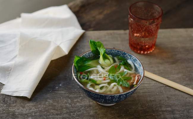 Korean noodle soup with bok choy — Stock Photo