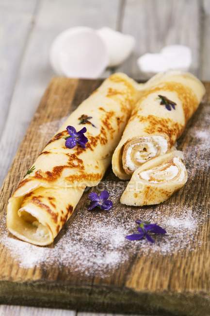 Pancakes filled with cream cheese — Stock Photo