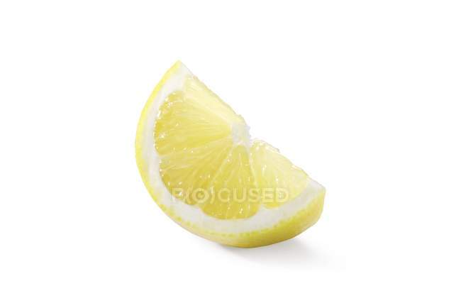 Fresh wedge of lemon — Stock Photo
