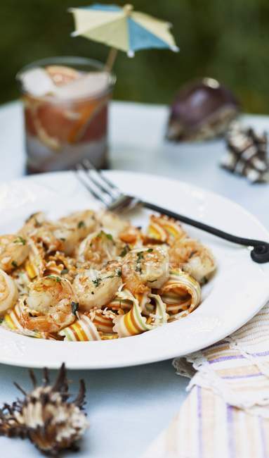 Colourful tagliatelle pasta with prawns — Stock Photo