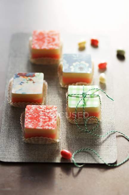 Petits fours topped with sugar glaze — Stock Photo